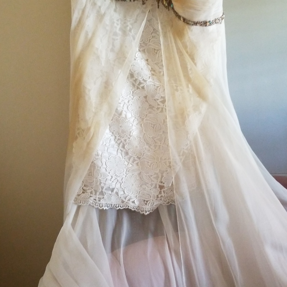 Beautiful white lace and floor length sheer panel